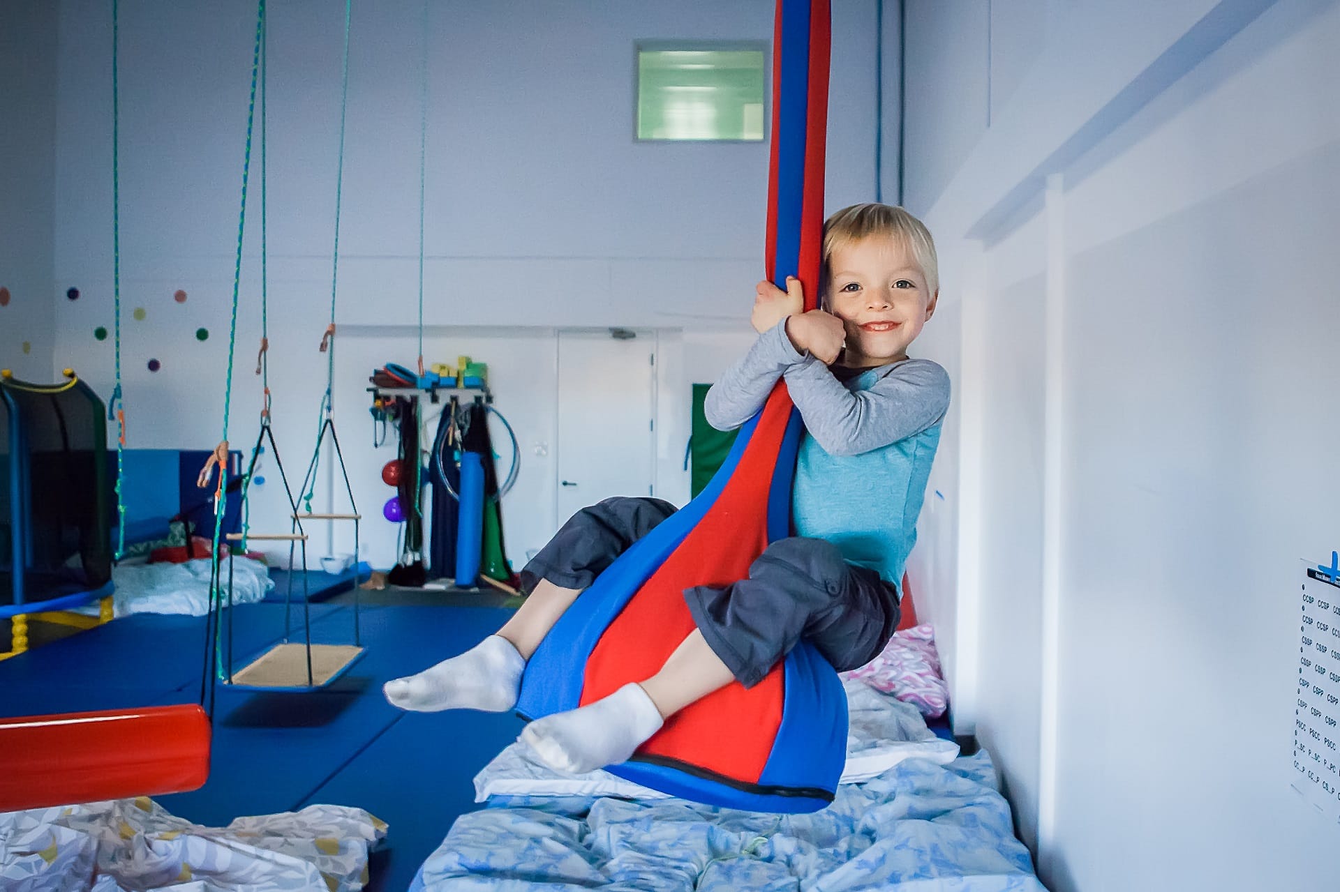 Child utilizing zip line.