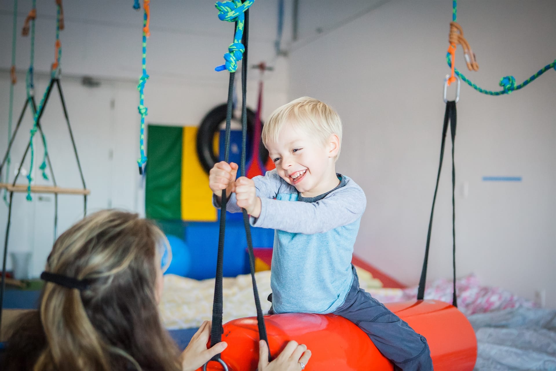 Child using suspension equipment.